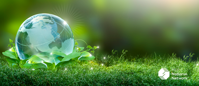 Globe with green grass - Sustainable Manufacturing