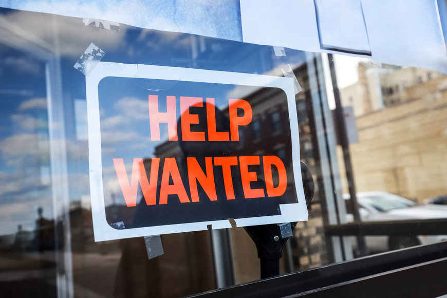 Help wanted sign in a window
