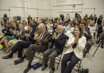 Attendees celebrating the grand opening of JARC RI included Rhode Island Senator Jack Reed, Senator Sheldon Whitehouse, Providence Mayor Brett Smiley, and Commerce Secretary Liz Tanner.